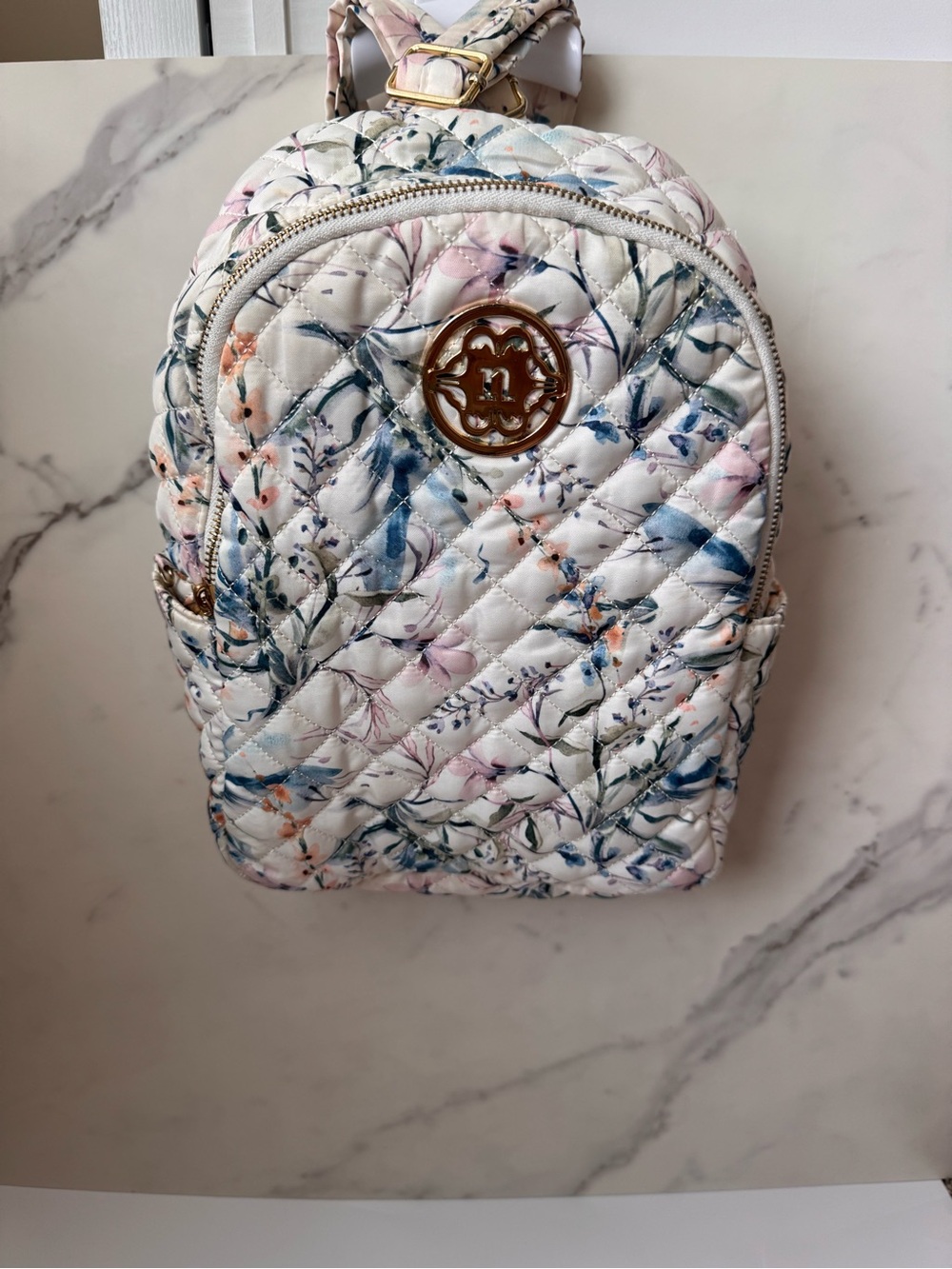 Nanette Lepore Quilted Floral Mini Backpack in White with Pastel Accents